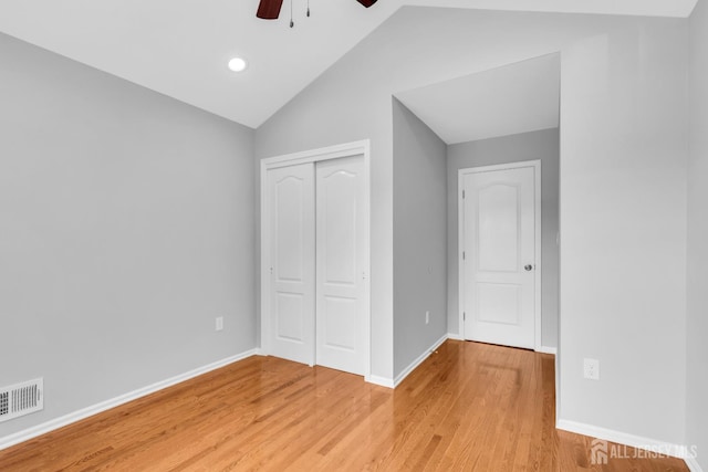 242 Hawthorne Rd, North Brunswick, NJ 08902 - unfurnished bedroom with a closet, light wood-type flooring, vaulted ceiling, a ceiling fan, and recessed lighting