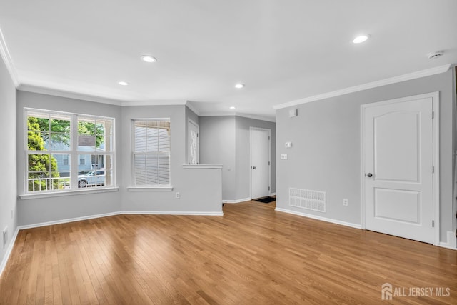 242 Hawthorne Rd, North Brunswick, NJ 08902 - empty room featuring crown molding, light wood-style flooring, recessed lighting, and a smoke detector