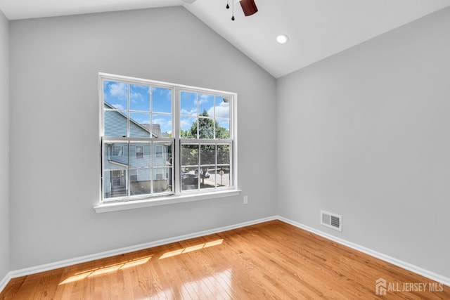 242 Hawthorne Rd, North Brunswick, NJ 08902 - empty room featuring vaulted ceiling, a ceiling fan, light wood-style flooring, and recessed lighting