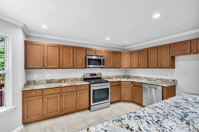 242 Hawthorne Rd, North Brunswick, NJ 08902 - kitchen featuring appliances with stainless steel finishes, brown cabinetry, light stone countertops, crown molding, and recessed lighting