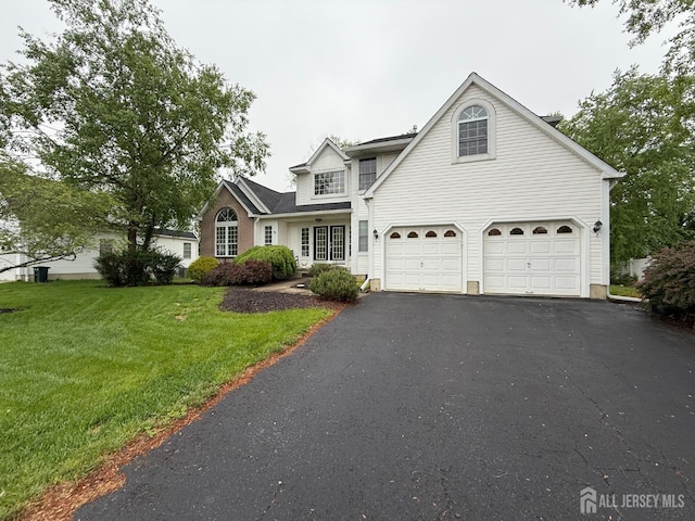 6 Ryan Ct, South Brunswick, NJ 08852 - traditional home with driveway, a front yard, and a garage