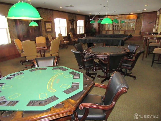 game room featuring carpet flooring, pool table, and wooden walls