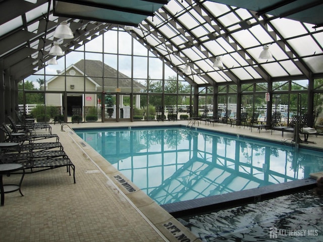 view of swimming pool featuring a patio