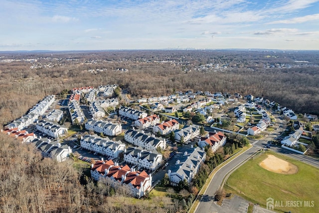 birds eye view of property with a residential view