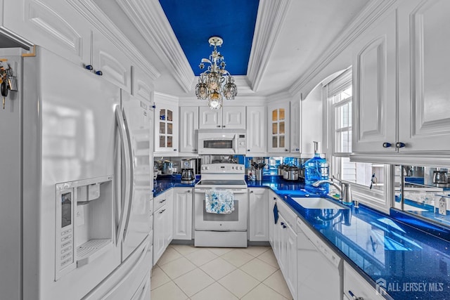 kitchen featuring white cabinetry, sink, white appliances, light tile patterned floors, and ornamental molding