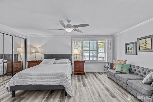 bedroom with ceiling fan, a closet, light wood-type flooring, and ornamental molding