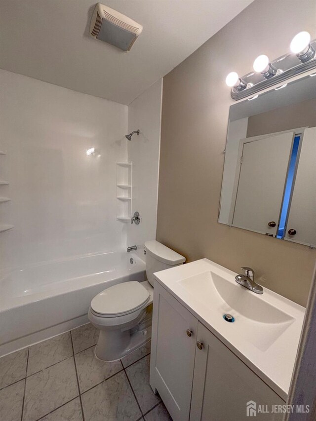 full bath featuring visible vents, shower / washtub combination, vanity, and toilet