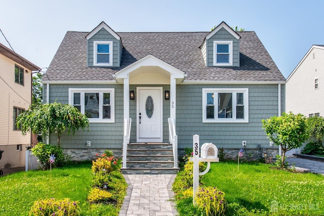 35 Evergreen Ave, Fords, NJ 08863 - cape cod home with a front lawn and a shingled roof