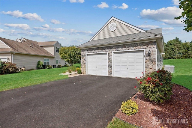 garage with a lawn