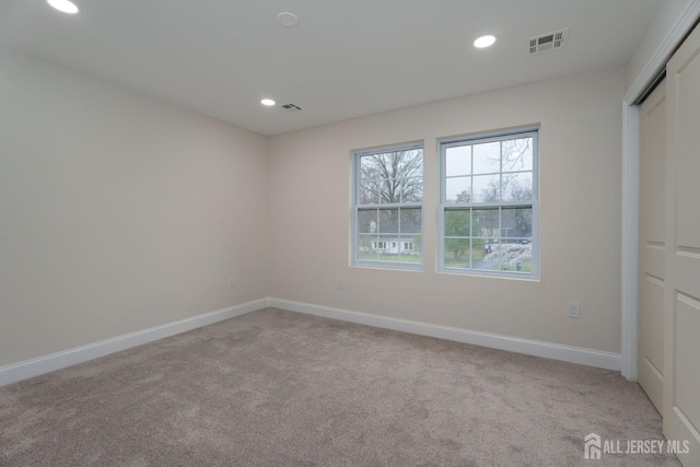 237 Varsity Ave, West Windsor, NJ 08540 - unfurnished bedroom featuring light carpet, recessed lighting, and a closet
