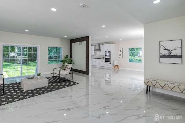 237 Varsity Ave, West Windsor, NJ 08540 - living area with recessed lighting and light marble finish flooring