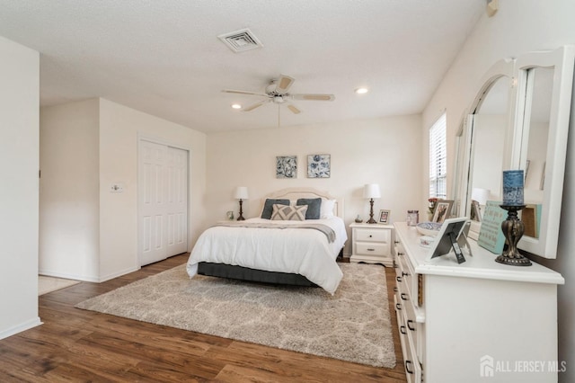 bedroom with visible vents, wood finished floors, baseboards, recessed lighting, and a ceiling fan