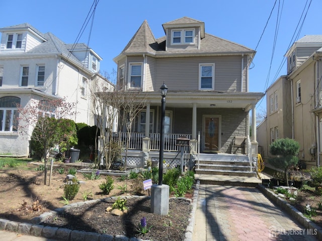 view of front of property with covered porch