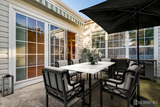 view of patio featuring outdoor dining space