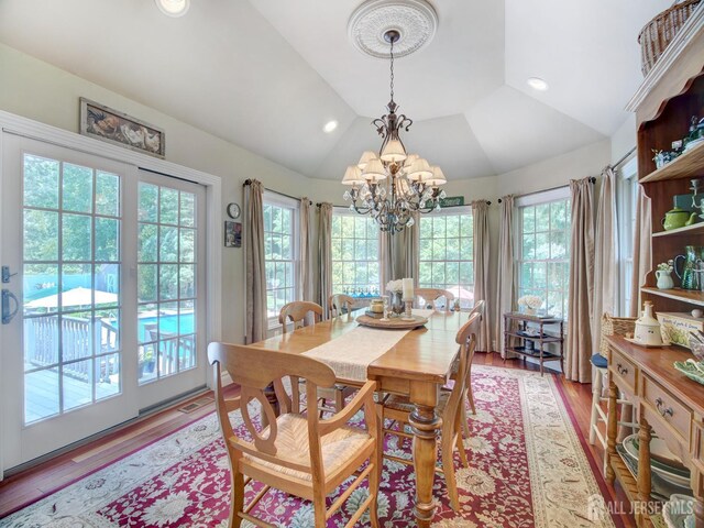 7 Willis Ct, East Brunswick, NJ 08816 - dining room featuring a chandelier, plenty of natural light, light wood-style flooring, recessed lighting, and lofted ceiling
