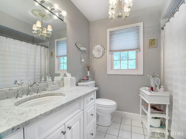 7 Willis Ct, East Brunswick, NJ 08816 - full bathroom featuring a chandelier, tile patterned floors, and vanity