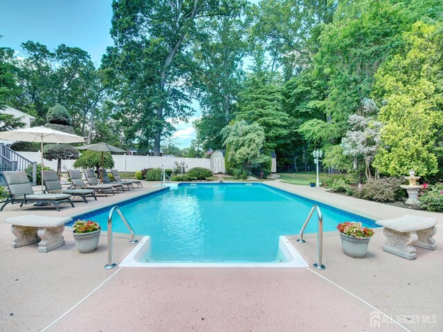 7 Willis Ct, East Brunswick, NJ 08816 - view of swimming pool with a patio and a shed