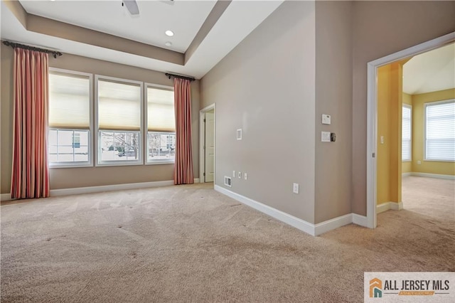 spare room featuring recessed lighting, baseboards, ceiling fan, and carpet flooring