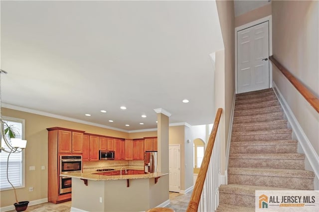 stairway featuring recessed lighting, baseboards, and ornamental molding