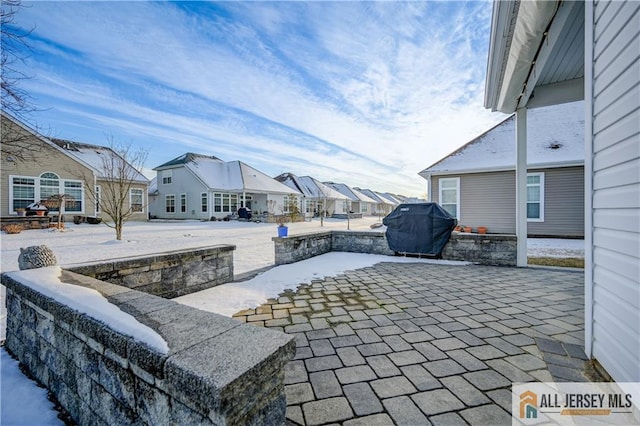 view of patio / terrace with a residential view and grilling area