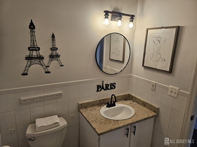 16 Park Sq, Metuchen, NJ 08840 - bathroom with vanity, tile walls, and wainscoting
