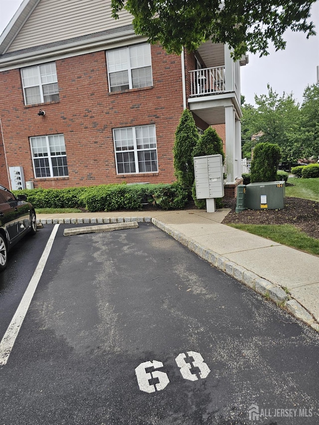 16 Park Sq, Metuchen, NJ 08840 - uncovered parking lot featuring mail area