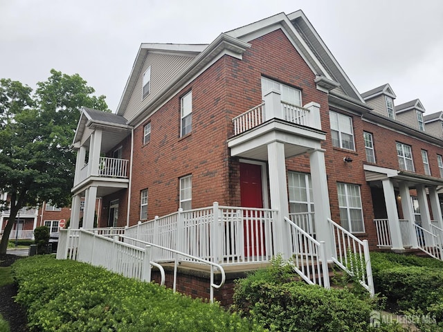 16 Park Sq, Metuchen, NJ 08840 - view of home's exterior featuring a balcony and brick siding