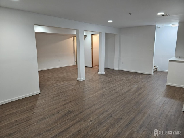 16 Park Sq, Metuchen, NJ 08840 - finished basement featuring dark wood-type flooring, recessed lighting, and stairway