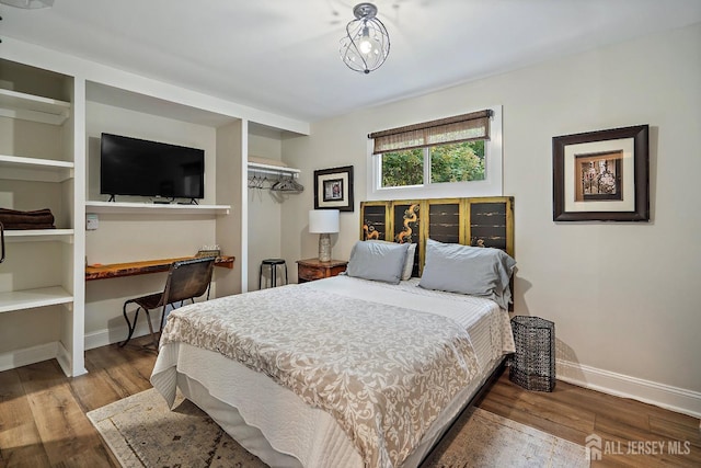 bedroom featuring a closet and wood-type flooring