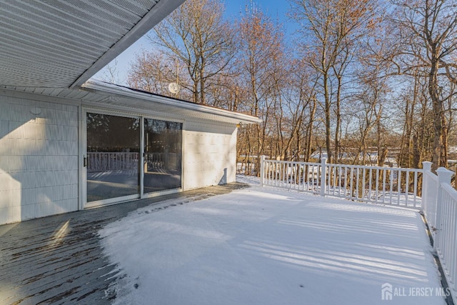 view of snow covered deck