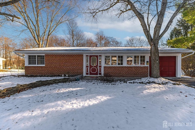 single story home with a garage