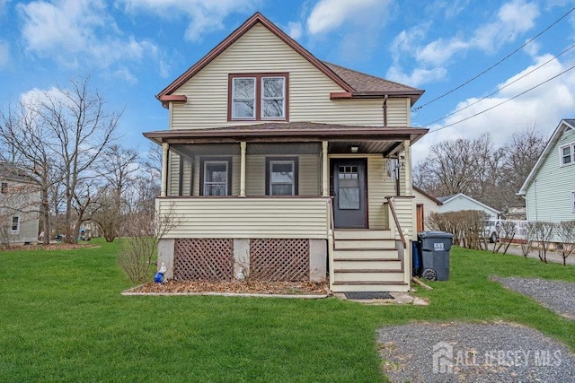 186 Brahma Ave, Bridgewater, NJ 08807 - view of front facade featuring a front lawn, covered porch, and roof with shingles