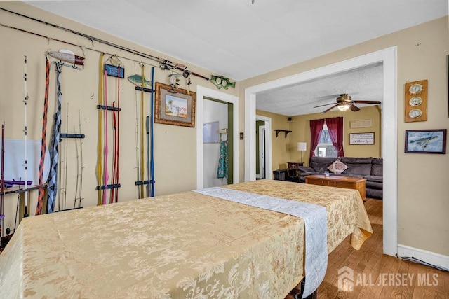 186 Brahma Ave, Bridgewater, NJ 08807 - bedroom with wood finished floors, baseboards, and ceiling fan