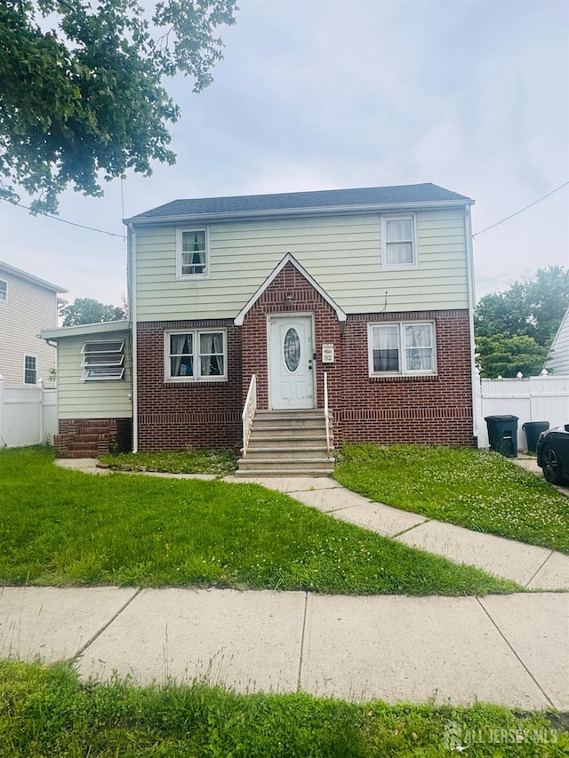 52 Hermann Ave, Carteret, NJ 07008 - view of front facade with brick siding and entry steps