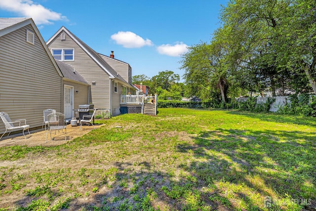 858 Burnt Tavern Rd, Brick, NJ 08724 - view of green lawn featuring a deck and a patio