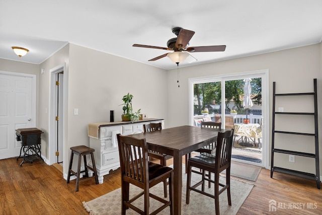 858 Burnt Tavern Rd, Brick, NJ 08724 - dining room featuring light wood-type flooring, a ceiling fan, and crown molding