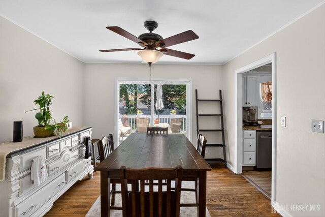 858 Burnt Tavern Rd, Brick, NJ 08724 - dining room featuring dark wood finished floors, ceiling fan, and ornamental molding