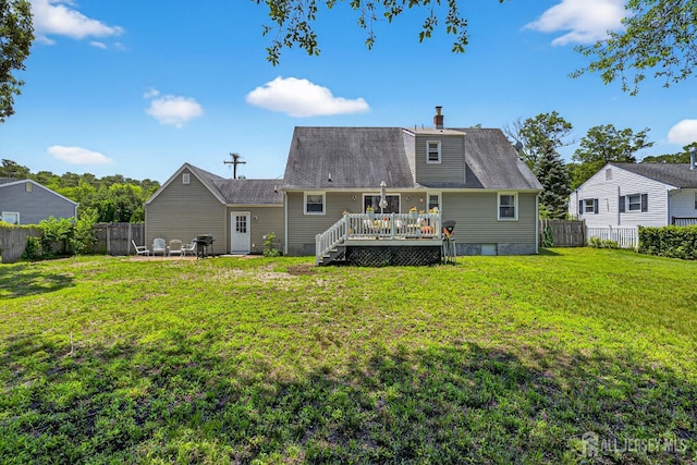 858 Burnt Tavern Rd, Brick, NJ 08724 - back of house featuring a fenced backyard, a wooden deck, a chimney, and a patio