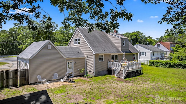 858 Burnt Tavern Rd, Brick, NJ 08724 - rear view of house featuring a deck and a shingled roof