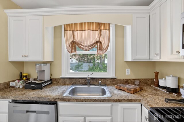 858 Burnt Tavern Rd, Brick, NJ 08724 - kitchen featuring stainless steel dishwasher and white cabinetry