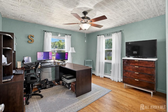 858 Burnt Tavern Rd, Brick, NJ 08724 - office space featuring a ceiling fan, wood finished floors, and a baseboard heating unit