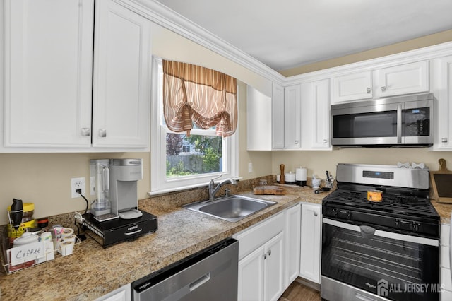 858 Burnt Tavern Rd, Brick, NJ 08724 - kitchen with stainless steel appliances and white cabinets