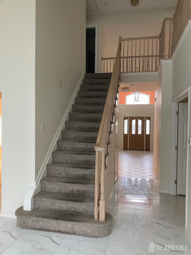 46 Chichester Rd, Monroe, NJ 08831 - staircase featuring marble finish floors and baseboards