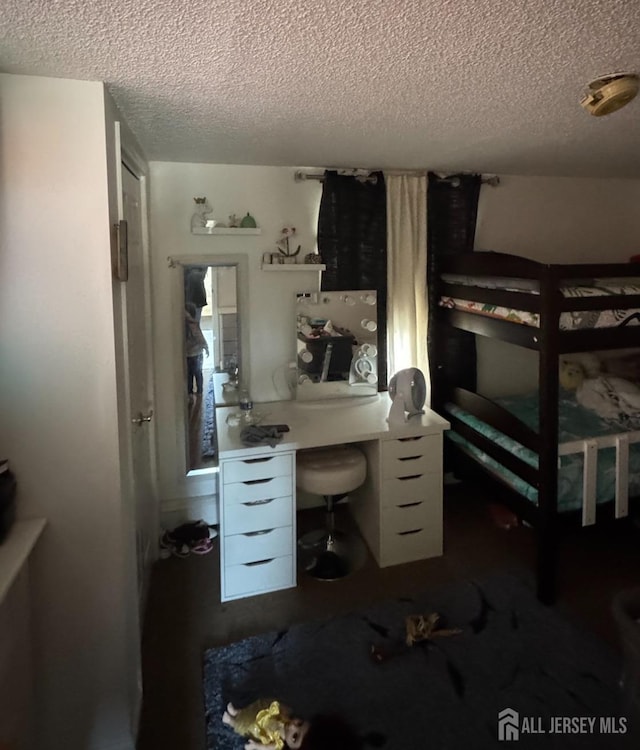 bedroom with a textured ceiling