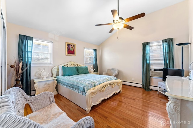 39 Webb Dr, Fords, NJ 08863 - bedroom featuring light wood-style flooring, lofted ceiling, cooling unit, a baseboard heating unit, and a ceiling fan