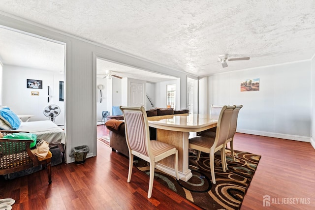 39 Webb Dr, Fords, NJ 08863 - dining room featuring ceiling fan, a textured ceiling, dark wood-style floors, and a baseboard heating unit