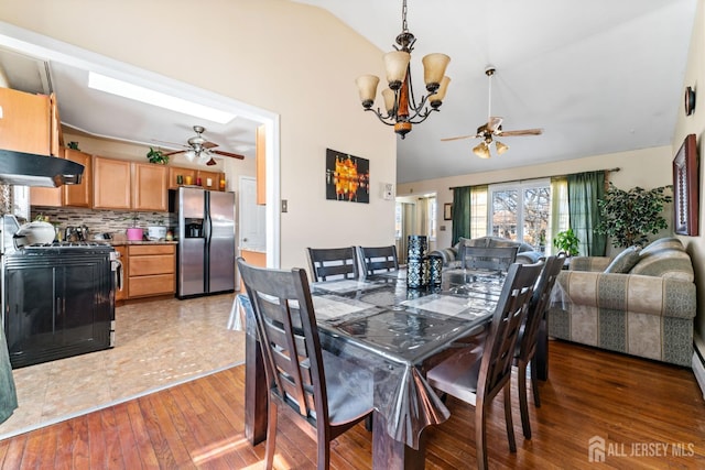 39 Webb Dr, Fords, NJ 08863 - dining space with ceiling fan, light wood-style flooring, a chandelier, and high vaulted ceiling