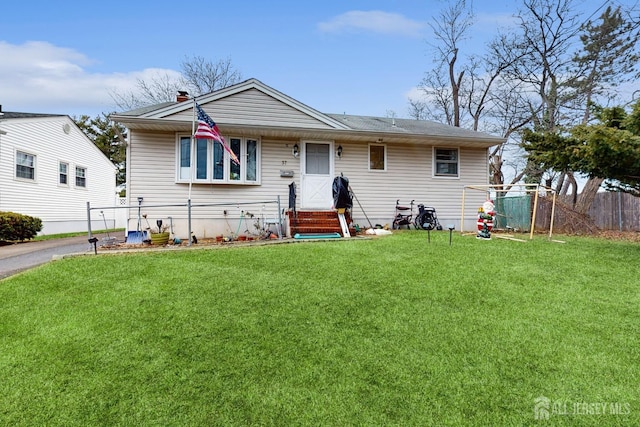 view of front of home featuring a front lawn