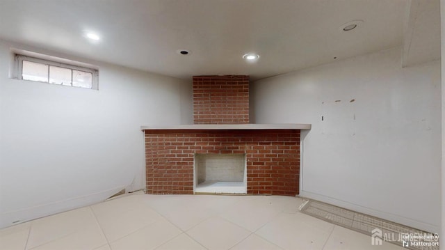 unfurnished living room featuring tile patterned floors