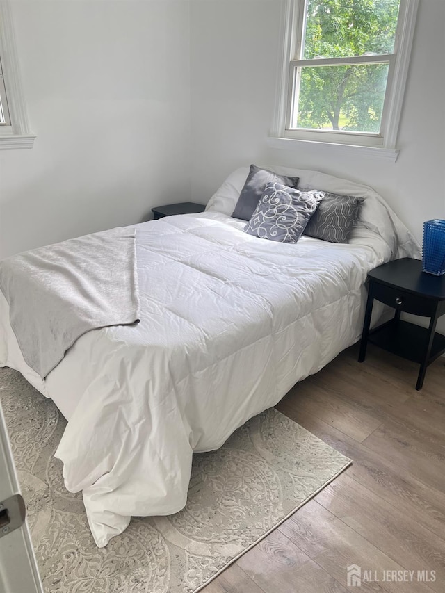 212 Huff Ave, Manville, NJ 08835 - bedroom featuring wood finished floors